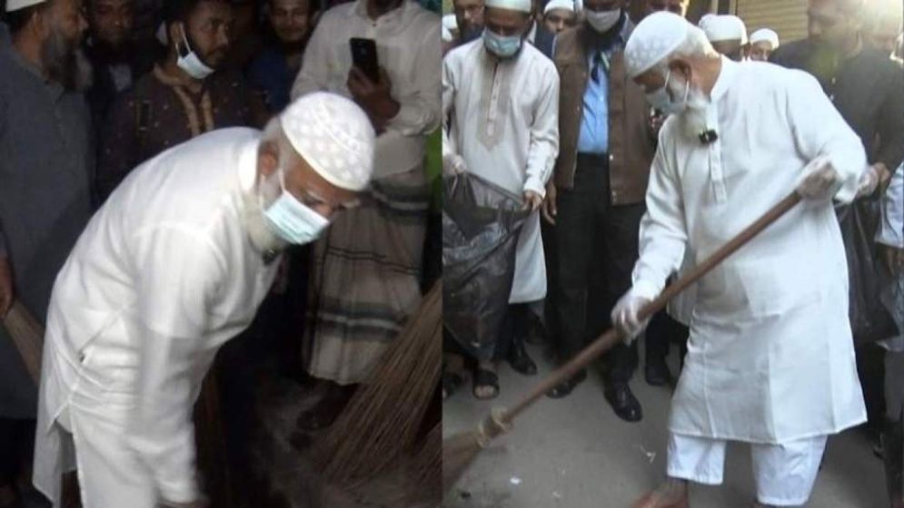 ঝাড়ু নিয়ে রাস্তা পরিষ্কার করলেন জামায়াত আমির